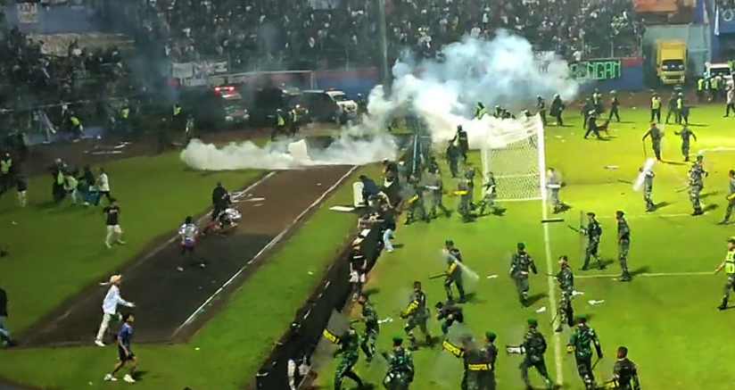 129 people killed after rioting football fans trigger stampede in Indonesia