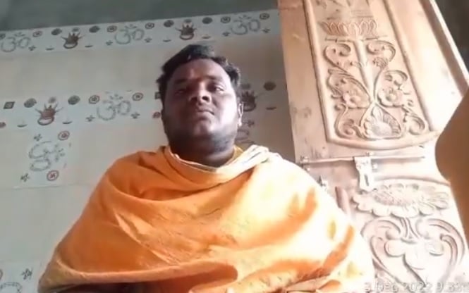 Temple priest being forced to convert to Christianity