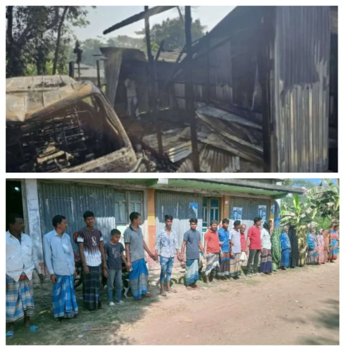 Line of Hindu families standing outside damaged homes after violence in Noakhali, Bangladesh.