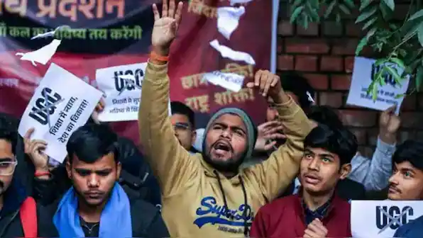 Protesters holding banners and raising slogans during a Hindu rally in India.