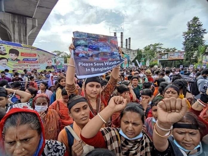 Hindu protest in Bangladesh for safety Protesters holding signs demanding protection for Hindus in Bangladesh.