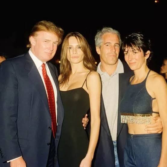 Group photo of well-dressed individuals at a formal event, related to Epstein Island controversy.