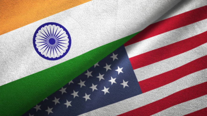 Image of Indian and American flags symbolizing trade concerns over GM foods.