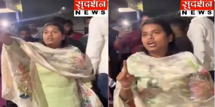 Hindu girl protesting against religious pressure and threats in a crowded setting.