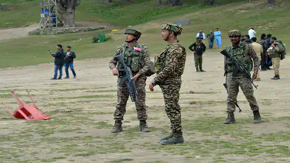 Indian Army soldiers on patrol in Pahalgam, Kashmir.