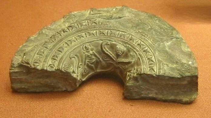 Ancient Hindu seal depicting symbols of wealth and wisdom from Hindu Dharma.