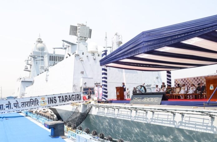 Indian Navy INS Taragiri frigate at launch event for regional security.