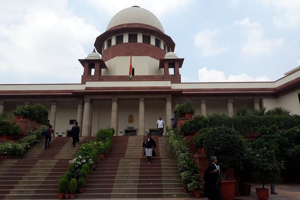 A Hindu temple with a large dome and steps, symbolizing Bharatiya traditions.