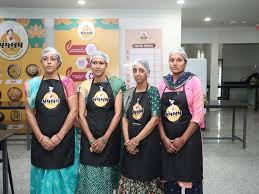 Women working at Gujarat Mangalam Canteen supporting financial independence.
