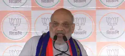 Image of Home Minister Amit Shah speaking at a BJP event in Bengal.