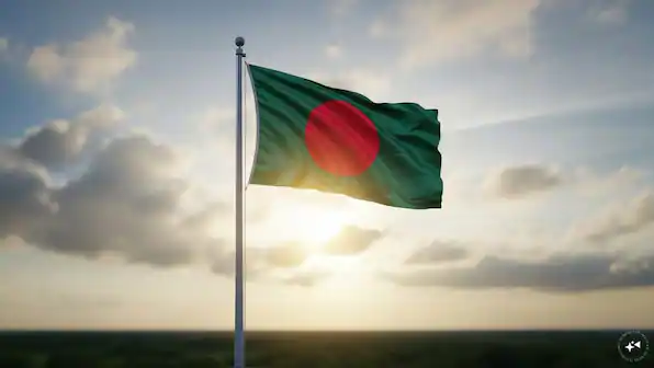 Bangladesh national flag flying at sunset, symbolizing national identity and resilience.