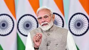 Indian Prime Minister Narendra Modi addressing the nation with Indian flags in the background, empha.