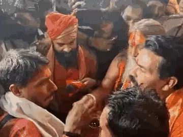 Hindu festival workers protest against bindi and tilak ban at a factory in Bhopal, tying kalava arou.
