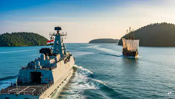 Indian naval ship sailing near Great Nicobar Island, strategic maritime control in Southeast Asia.