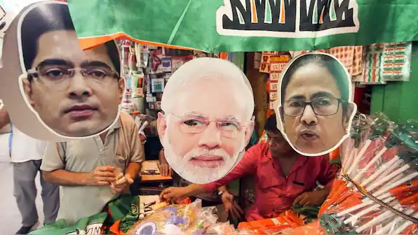 Political campaign in Bengal with faces of leaders and Bangladesh factor in the background.