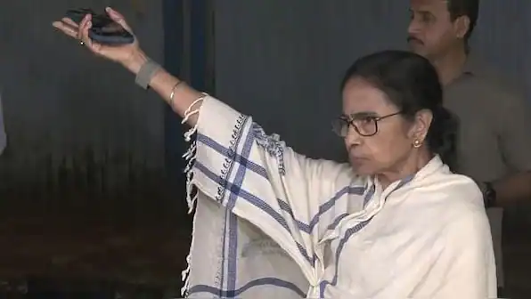 West Bengal leader taking a selfie during landslide relief efforts in West Bengal.
