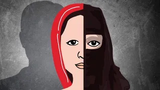 Hindu woman wearing traditional attire and head covering, representing cultural heritage.