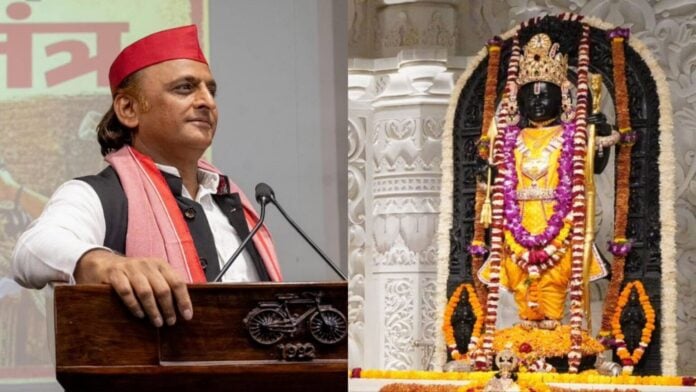 Hindu religious leader speaking at a cultural event with a decorated deity in the background.